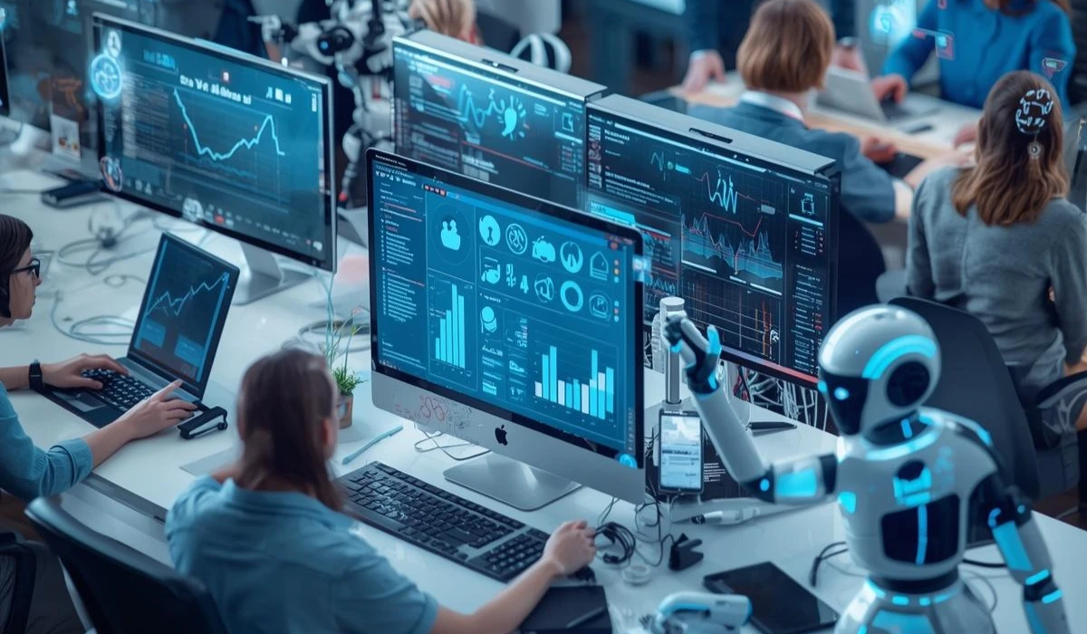 A diverse group of people collaborating at computers, with a friendly robot assisting them in their work.