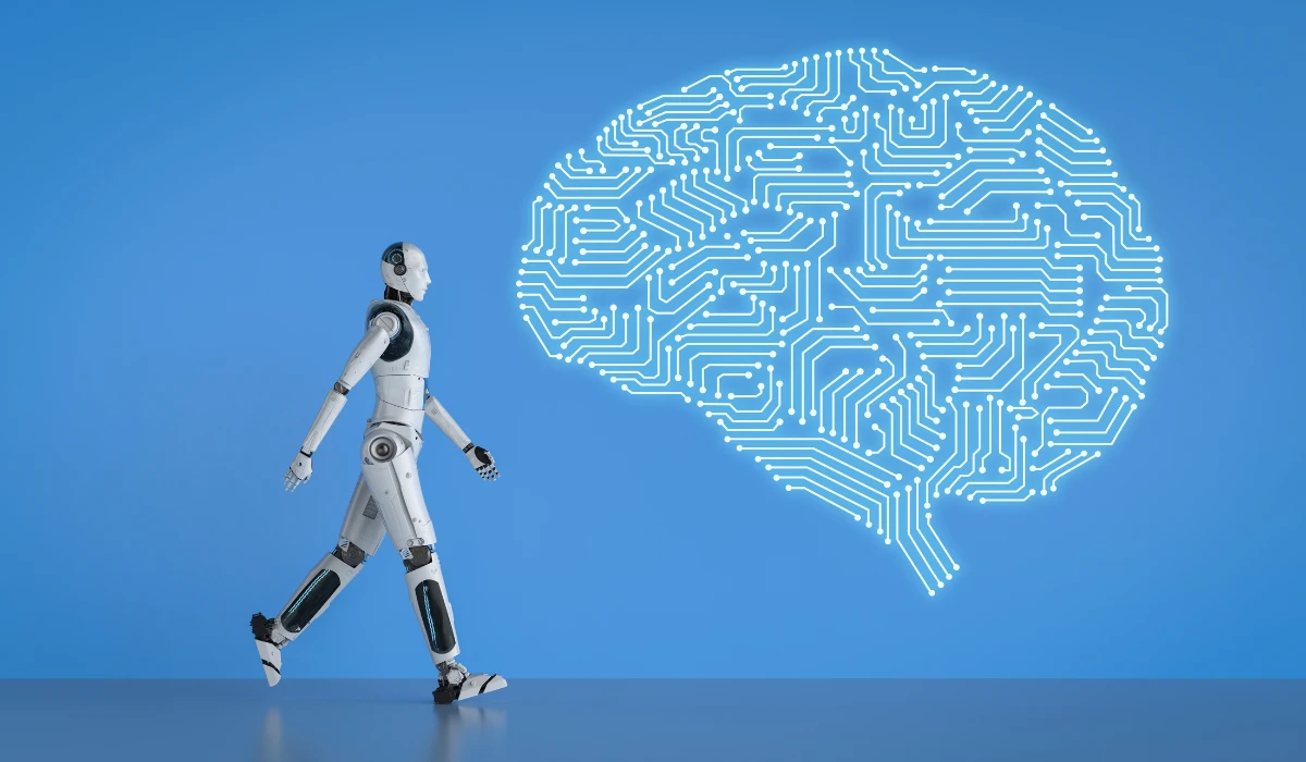 A robot approaches a brain-shaped image, symbolizing the connection between technology and intelligence.