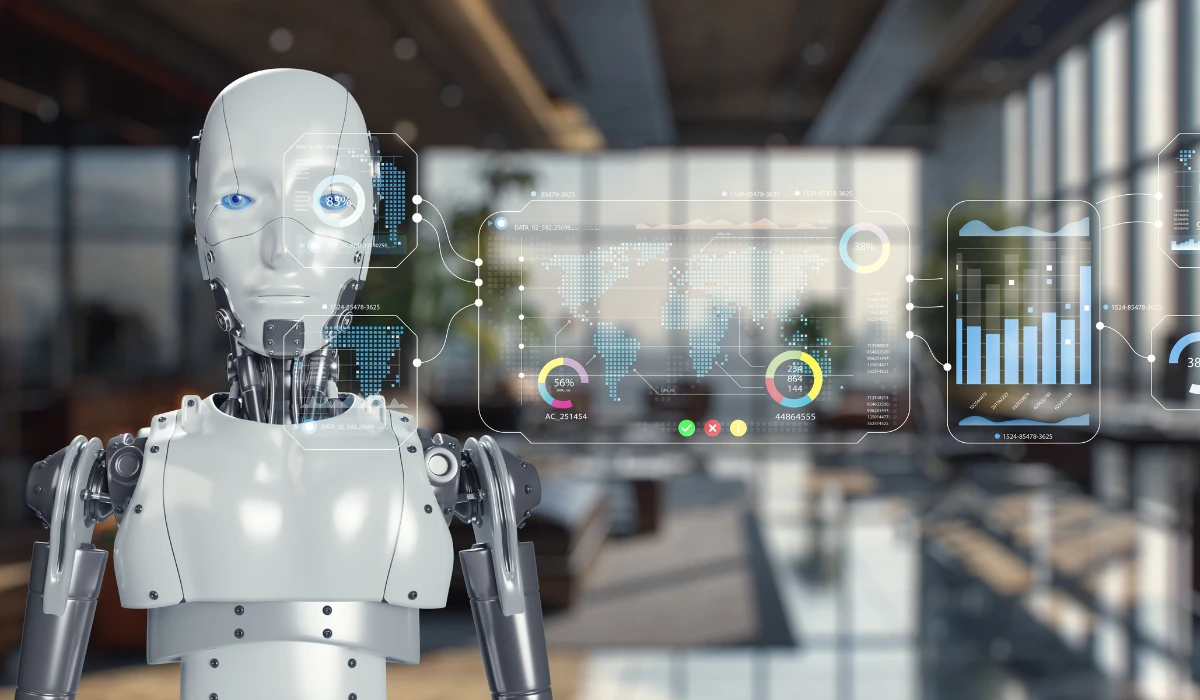 A robot is positioned in front of a large window, looking out into the distance.